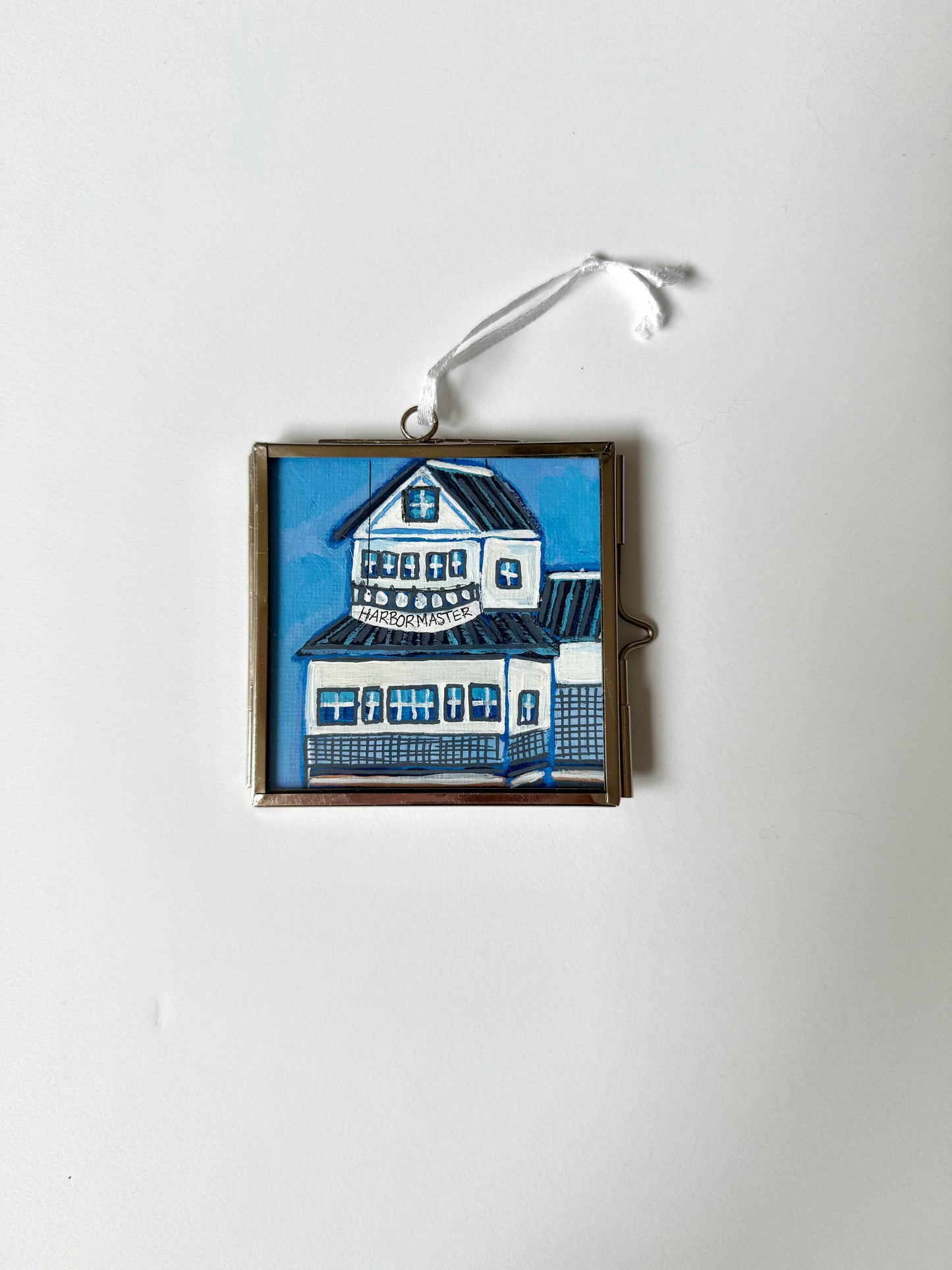 Glass framed ornament