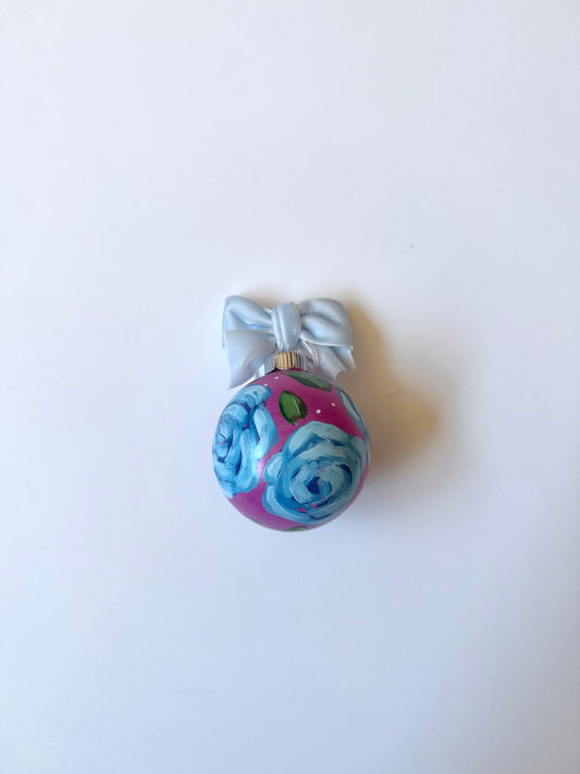 Blue roses with pink background